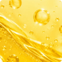 Close-up of the golden yellow RIN Glow Strip formula.